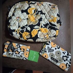 Vera Bradley triple set, checkbook cover, change purse, and bag. Like new.